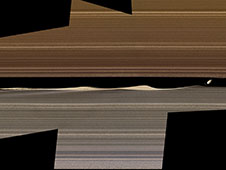 A false-color image mosaic shows Daphnis