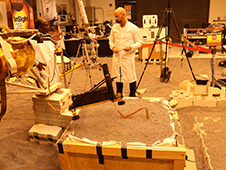 Engineers in a Mars-like test area at NASA's Jet Propulsion Laboratory