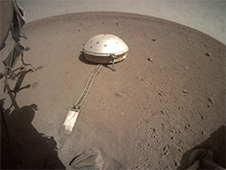 On June 28, 2019, NASA's InSight lander used its robotic arm to move the support structure for its digging instrument