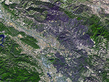 A large burn scar can be seen from space where the Kincade Fire has burned through Sonoma County, California.