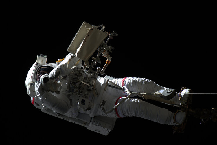 Luca photographed by Oleg Skripochka from inside the International Space Station