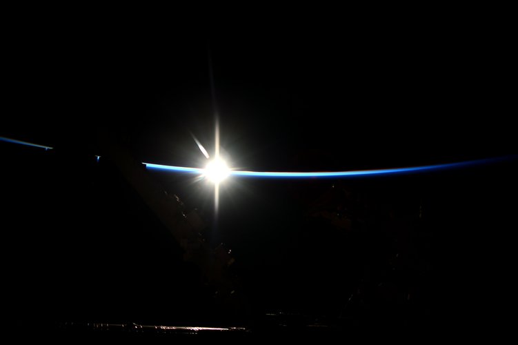 Space Station emerges from the darkness