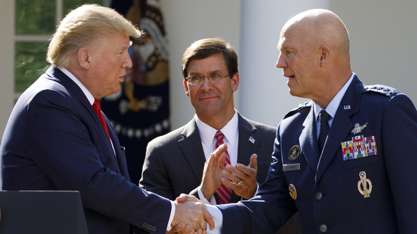 Gen. John "Jay" Raymond, with President Trump and Defense Secretary Mark Esper during a ceremony to establish the U.S. Space Command last summer.