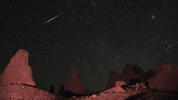 The Perseid Meteor Shower, pictured here near Death Valley, California, in 2019, is one of the most popular of the year. This summer, it peaks in the pre-dawn hours of Aug. 12.