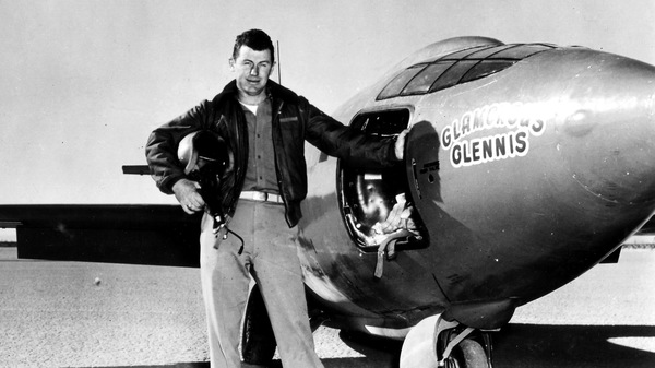 Chuck Yeager, standing next to the "Glamorous Glennis," the Bell X-1 experimental plane in which he first broke the sound barrier.
