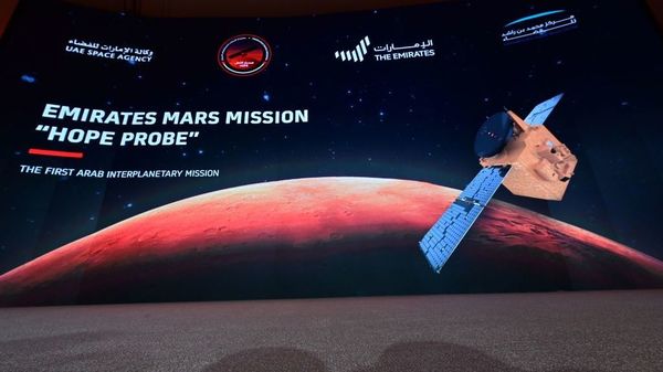 A picture taken on July 19, 2020, shows a screen broadcasting the launch of the "Hope" Mars probe at the Mohammed Bin Rashid Space Centre in Dubai. "Hope" — Al-Amal in Arabic — is expected to start orbiting Mars this week, marking the 50th anniversary of the unification of the UAE.