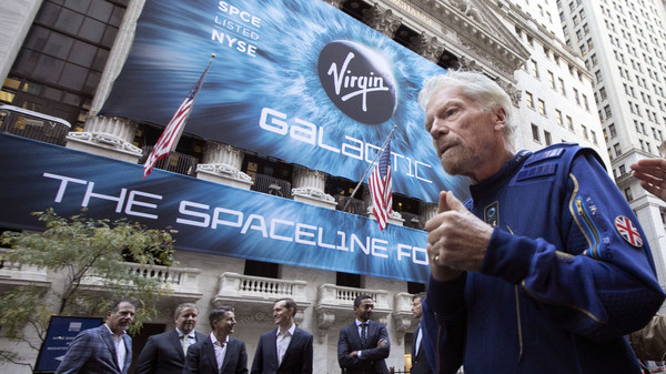 Richard Branson, right, founder of Virgin Galactic. Branson announced Thursday that he plans to fly into space this month on the next test flight of his Virgin Galactic rocket ship. The launch window will open July 11.