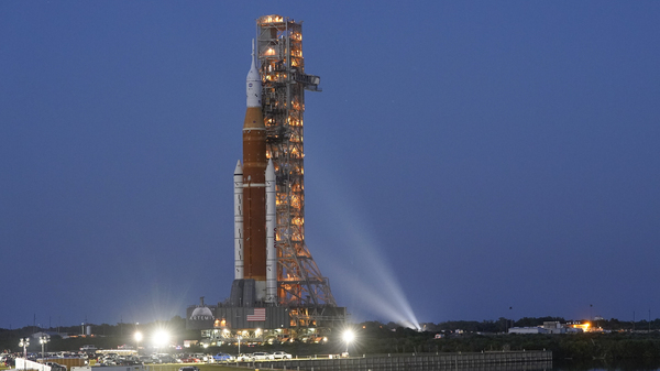 The NASA Artemis 1 rocket with the Orion spacecraft aboard moves slowly on an 11 hour journey to a launch pad at the Kennedy Space Center in Cape Canaveral, Fla., on Thursday, March 17, 2022.