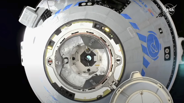 The Boeing Starliner prepares to dock at the International Space Station on Friday.