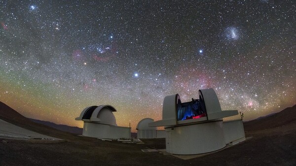 The telescopes of the SPECULOOS Southern Observatory in the Atacama Desert, Chile. The telescopes were used to confirm and characterize a new planet discovered by NASA, which led to the discovery of another nearby planet.