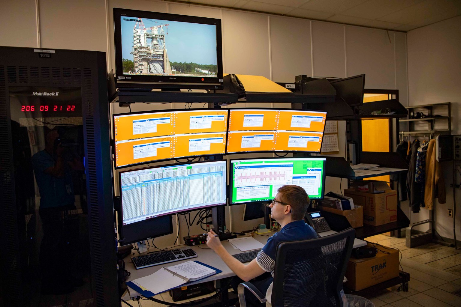 NASA instrumentation engineer Tristan Mooney prepares for an engine test