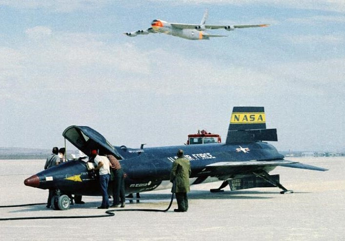 The B-52 carrier aircraft flies overhead to salute Petersen’s highest and fastest flight