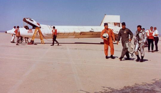 Knight, right, following his speed record-setting flight in October 1967