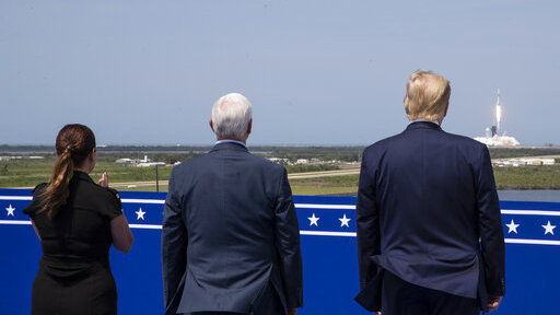 President Donald Trump, right, Vice President Mike Pence, and Karen Pence view the SpaceX flight to the International Space Station, at Kennedy Space Center, Saturday, May 30, 2020, in Cape Canaveral, Fla. (AP Photo/Alex Brandon)