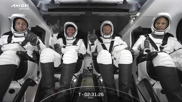 The SpaceX crew seated in the Dragon spacecraft earlier this month in Cape Canaveral, Fla.