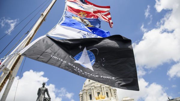 A United States Space Force flag flies along with flags of other armed service branches. The Space Force announced on Friday that the University of Puerto Rico at Mayagüez has joined its University Partnership Program.