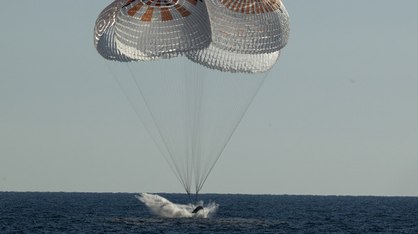 The SpaceX Crew Dragon Freedom capsule splashes down Friday in the Atlantic Ocean off Florida in a return trip from the International Space Station.