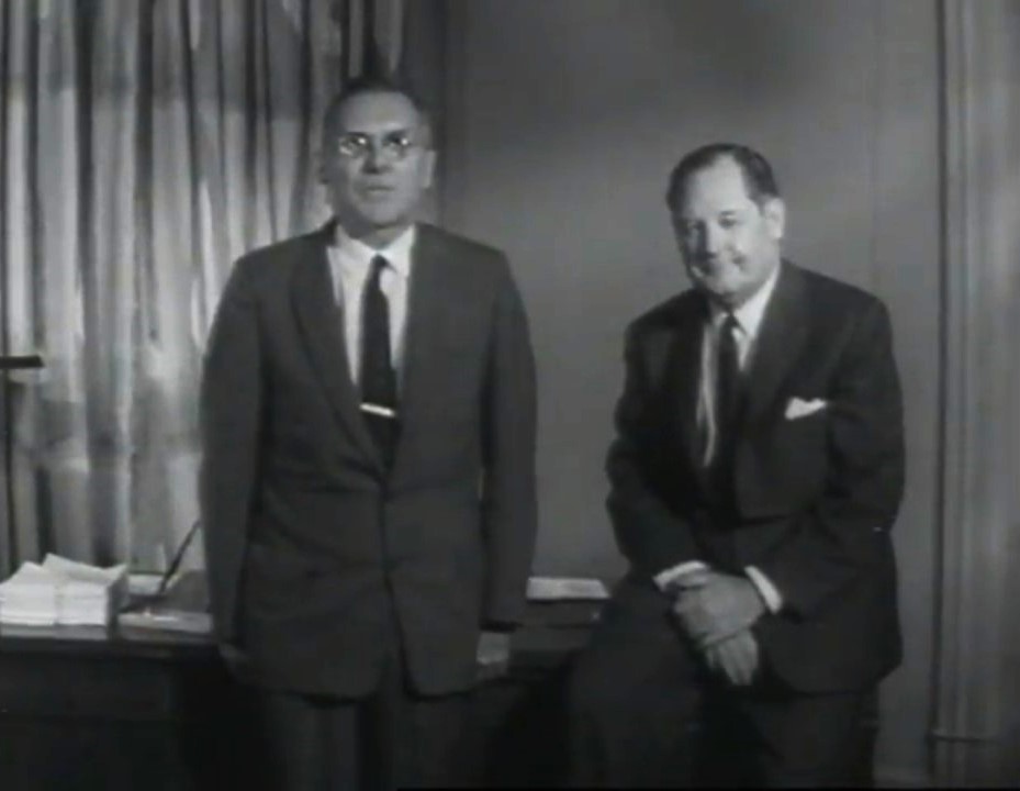 NASA Deputy Administrator Hugh L. Dryden, introduces NASA Administrator T. Keith Glennan as he prepares to deliver a filmed address to NACA employees about the impending transition to NASA