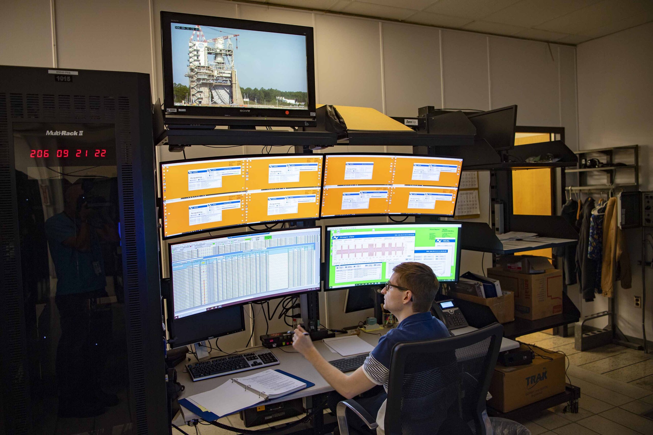 NASA instrumentation engineer Tristan Mooney prepares for an engine test